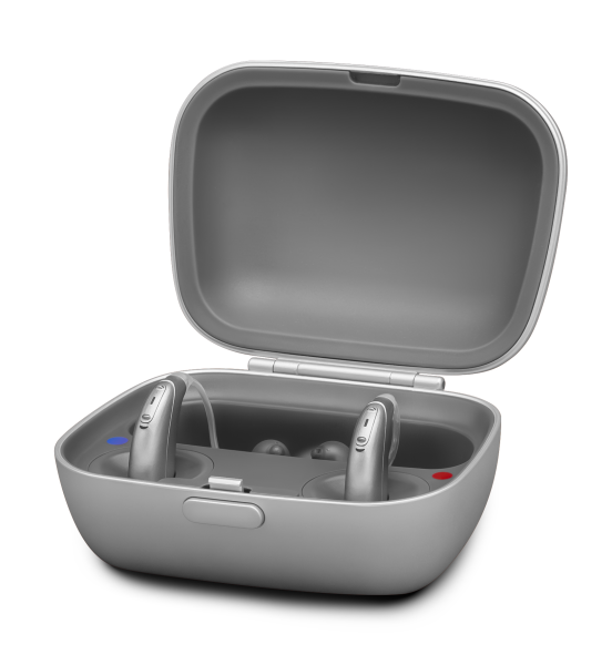 appareils auditifs rechargeables sur son socle pouvant recharger les appareils sans être branché